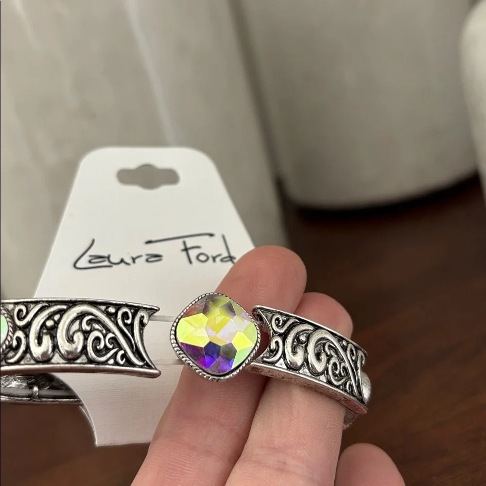 Laura Firs Stretch Embossed Silvertone w/iridescent beveled stones,stretch